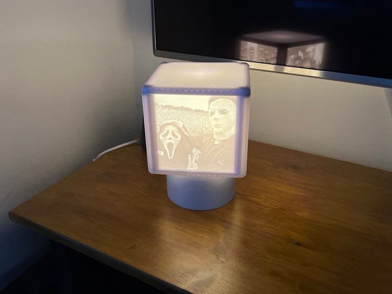 A lamp whose lit panels can be turned and changed.
